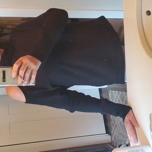 Black, asymmetrical cold shoulder sweater.